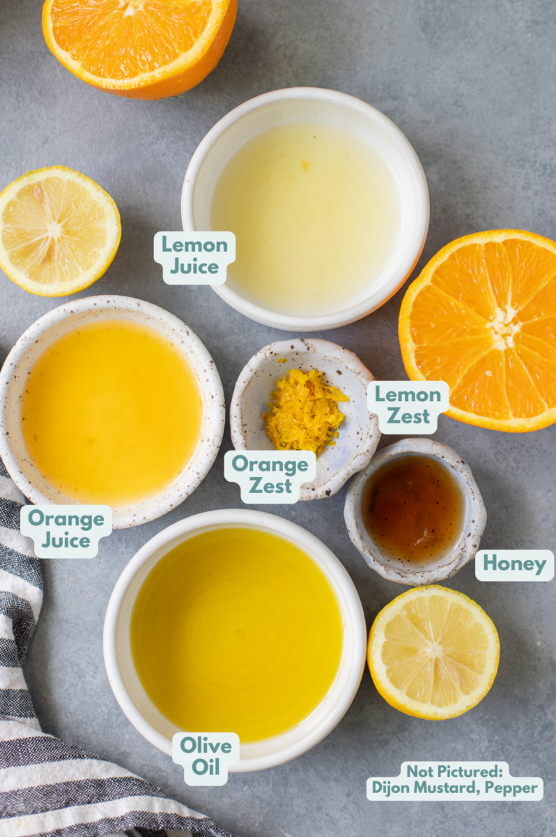 Ingredients for Citrus Salad Dressing in small white bowls