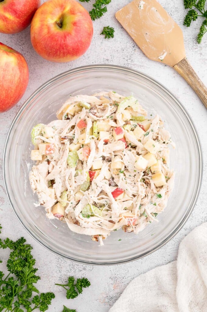 Healthy Chicken Salad mixed together in a glass bowl.