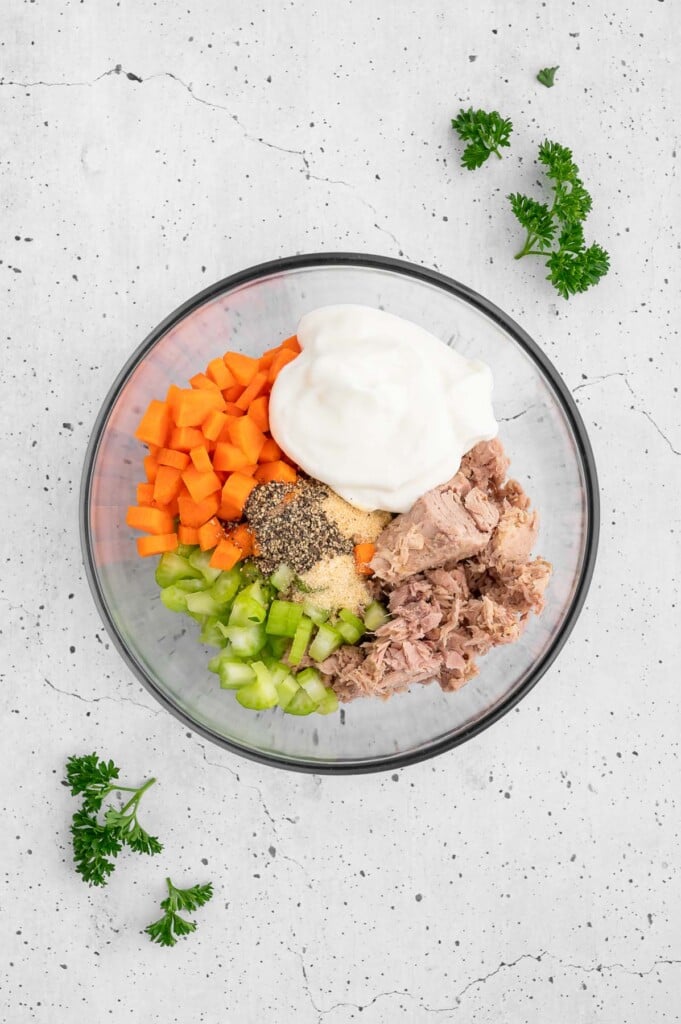 Ingredients Tuna Salad without Mayo chopped finely in a small white bowl before being mixed together.