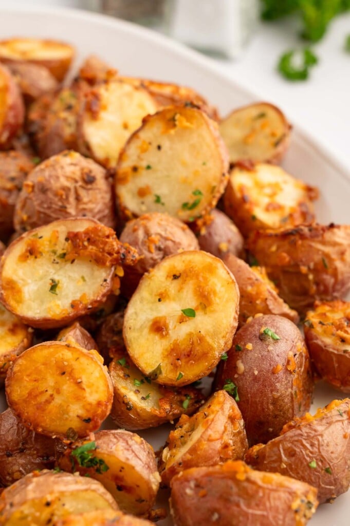Garlic Roasted Potatoes on a white platter.