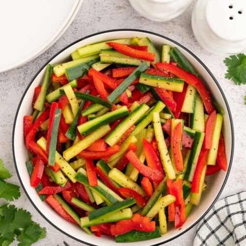An overhead shot of marinated vegetable salad in a large bowl.