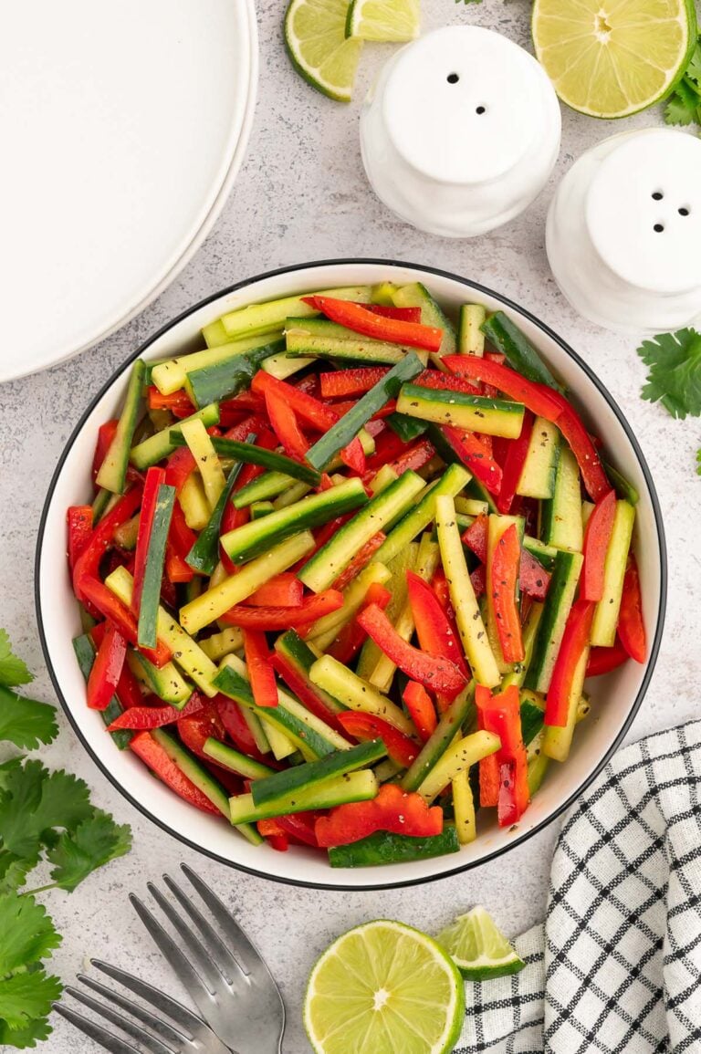 An overhead shot of marinated vegetable salad in a large bowl.