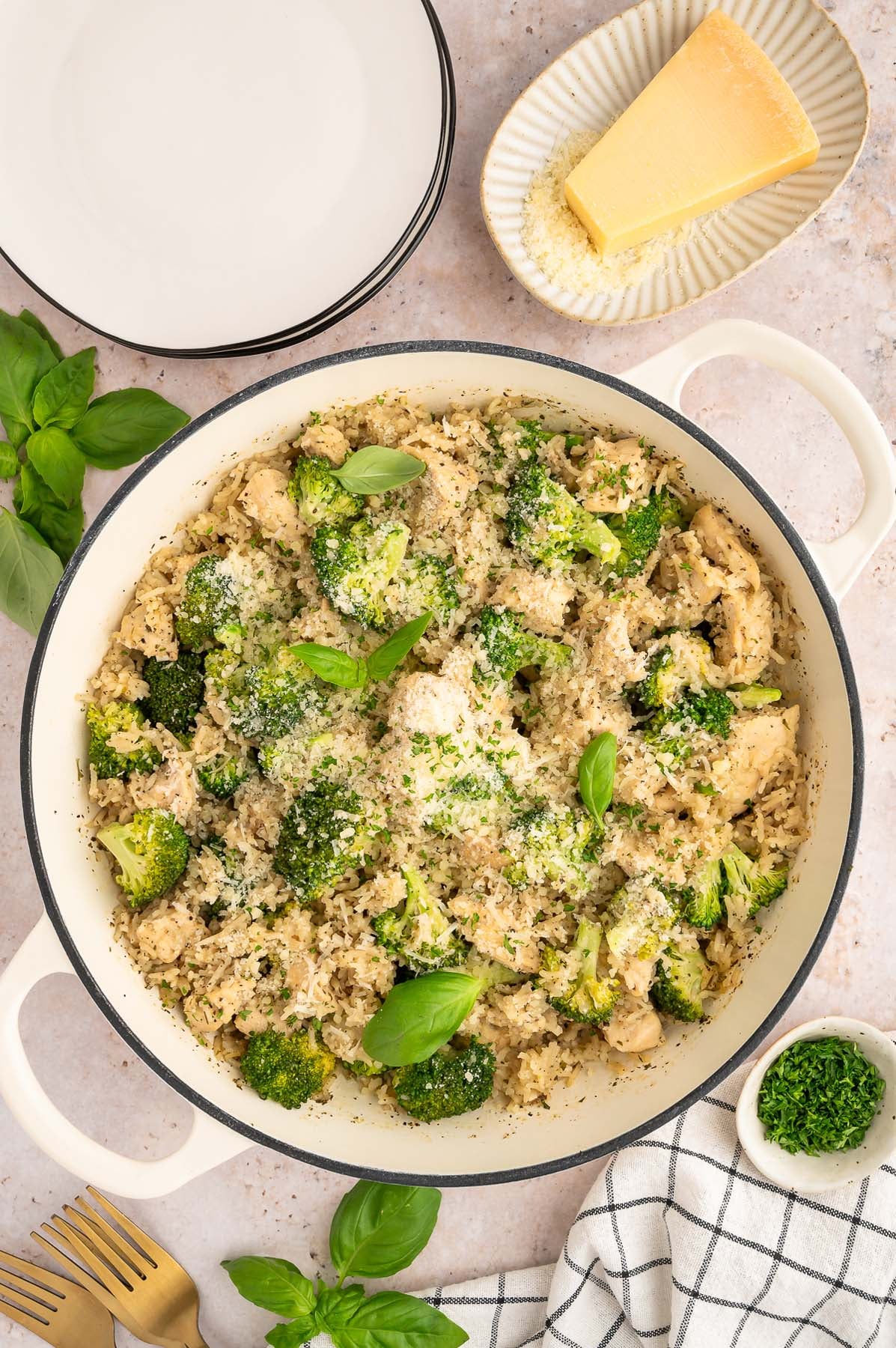 Healthy chicken and broccoli dinner in a large pot, viewed from overhead.