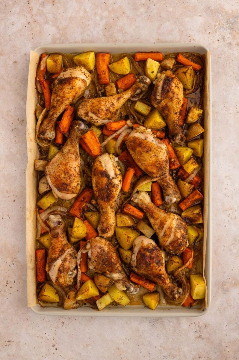 Chicken Drumstick dinner on a sheet pan right out of the oven.