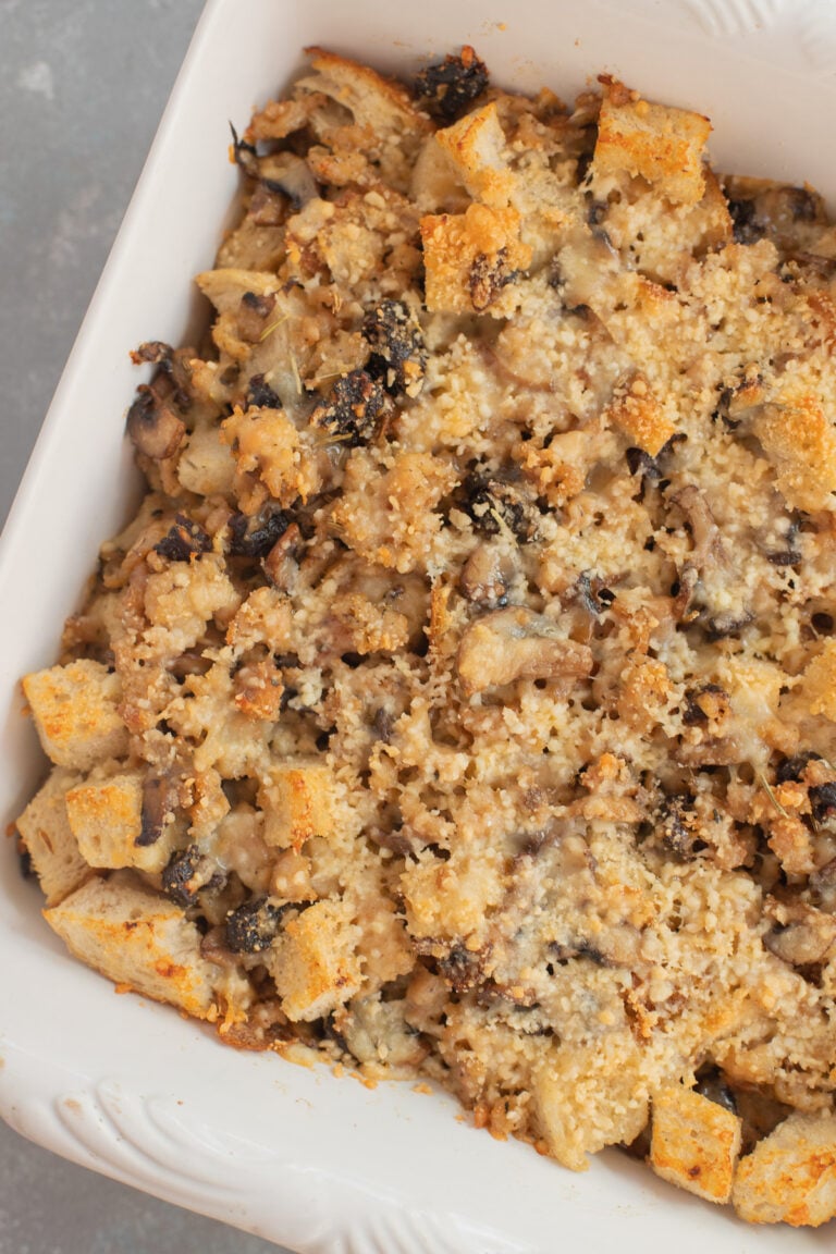 Sourdough Sausage Stuffing in a white baking dish.