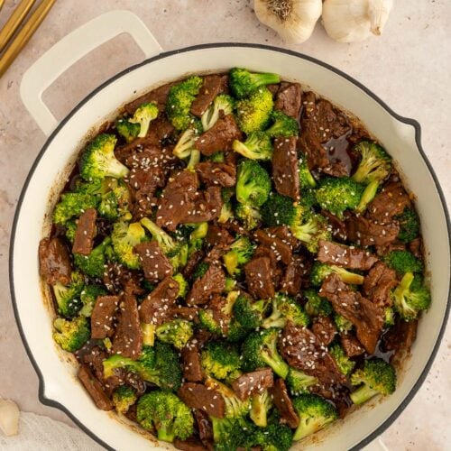 A pan of healthy beef and broccoli on a counter.