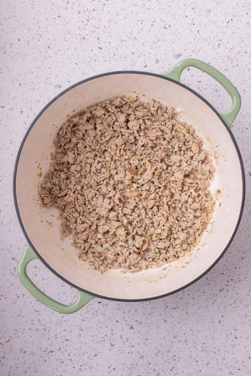 Ground turkey in a large dutch oven.