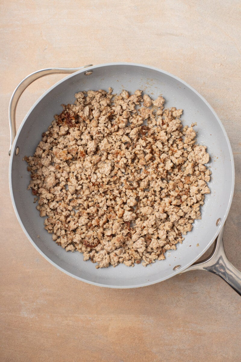 Ground pork browned in a saute pan.