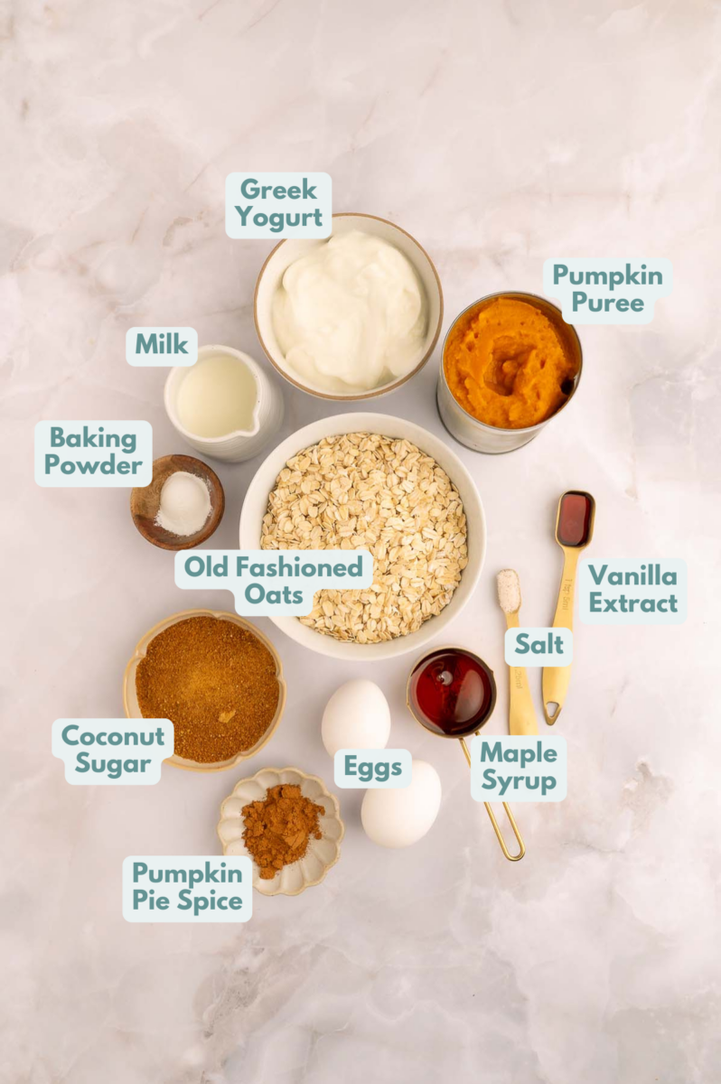 Labeled ingredients to make pumpkin baked oatmeal in small bowls and measuring cups.
