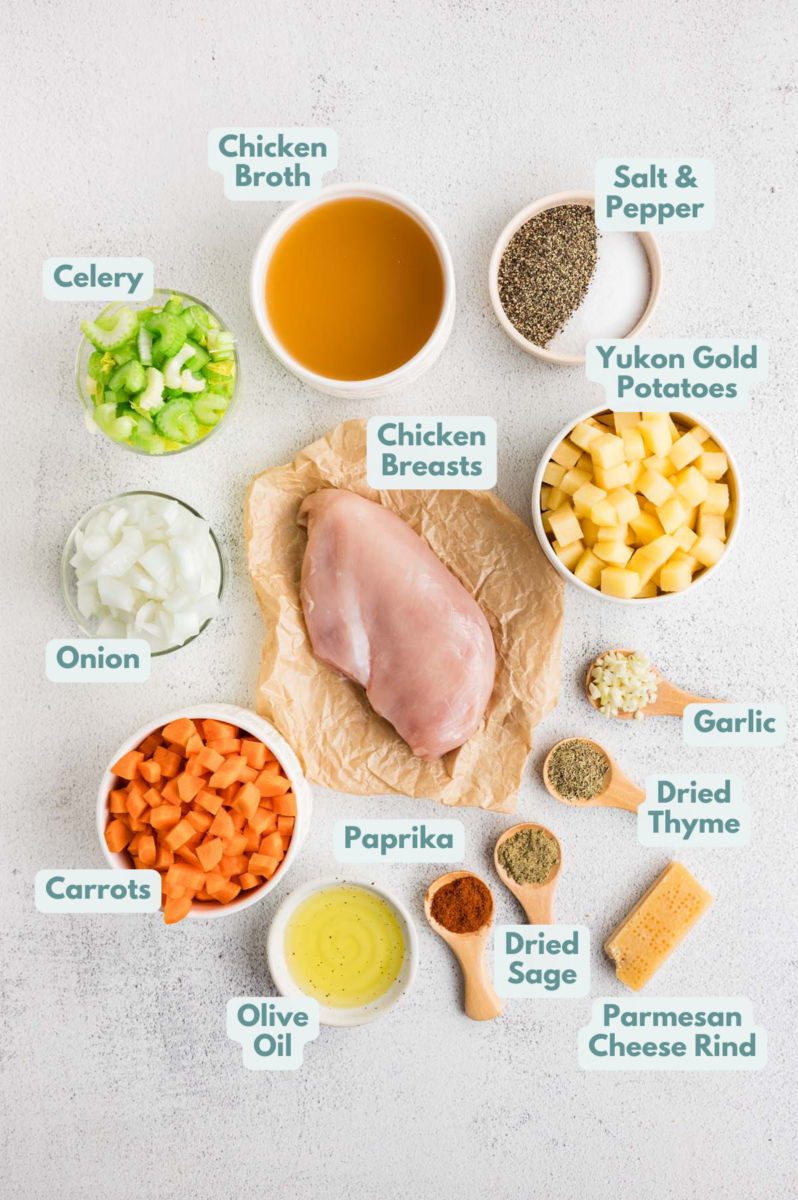 Labeled ingredients for chicken potato soup laid out in separate bowls.