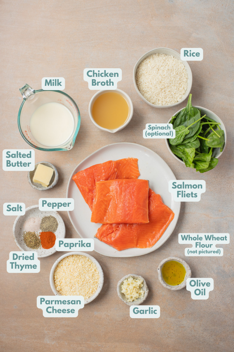 Labeled ingredients to make creamy garlic salmon in small bowls and measuring cups.