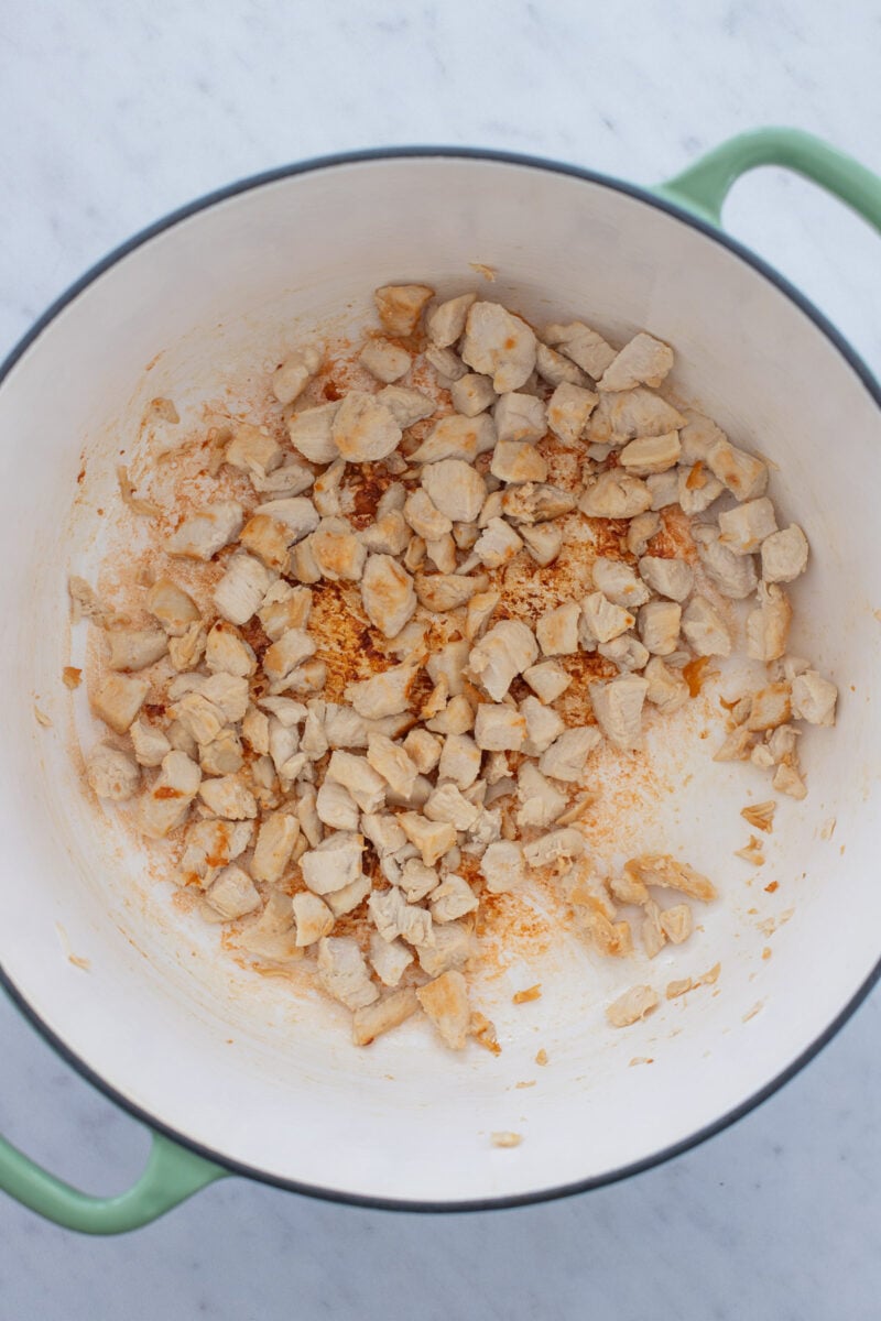 Chicken Breast pieces cooked in a dutch oven.