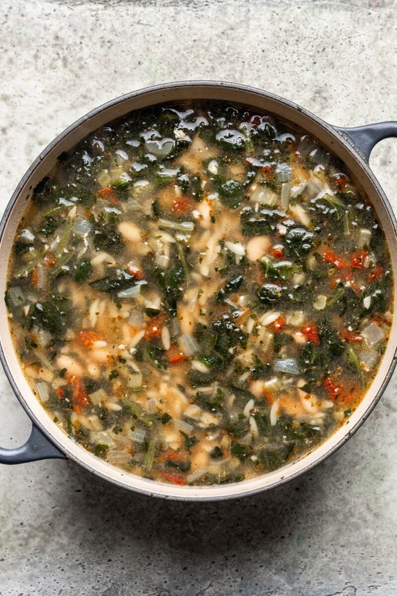 Tuscan Chicken Soup in a dutch oven.